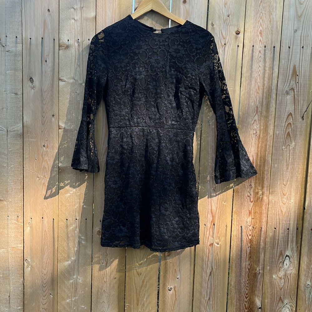 Black lace dress with bell sleeves